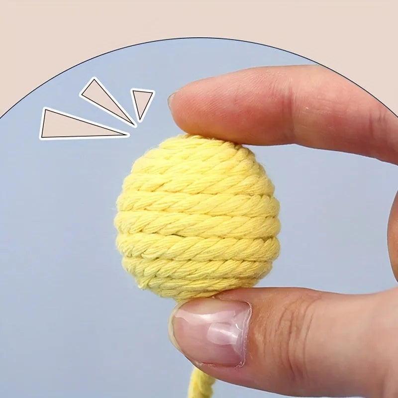 Colourful cat toy ball with rope attachment and built-in bell for interactive pet play