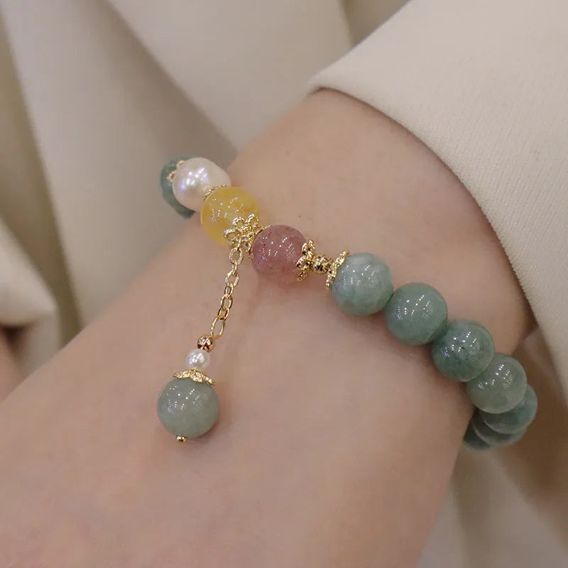 Geometric jade and pearl bracelet ornament in Han style with three-dimensional decoration.