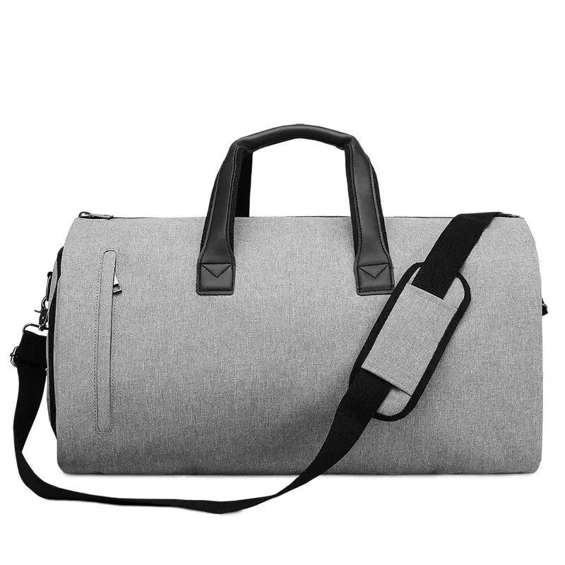 Medium oval travel bag in light grey with internal wet-dry separation and multiple organisation pockets.