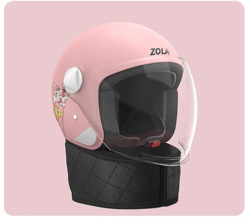 Blown Away winter cycling helmet with attached fleece scarf and clear anti-fog visor on a handlebar.