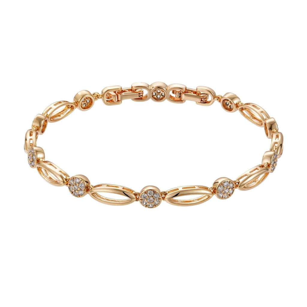 Golden hollow carved copper bracelet with U-shaped design on a wrist.