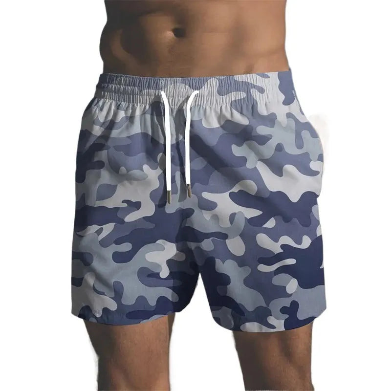 Men's polyester beach shorts with printed design and elastic waistband in multiple colour options