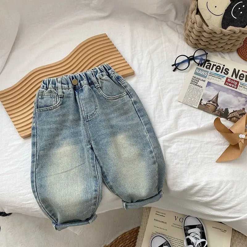 Boys casual light-coloured denim jeans with elastic waist and back pocket printing