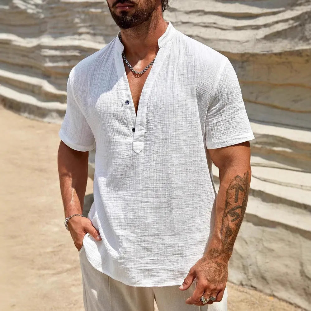 Men's solid colour short-sleeve shirt with a stand collar in a light blue shade.