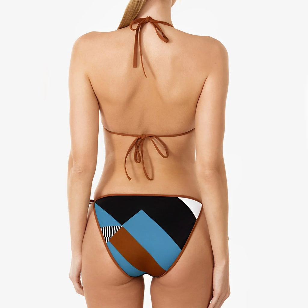 Women's skinny print split bikini set in picture colour, showing backless and sleeveless design on a mannequin.