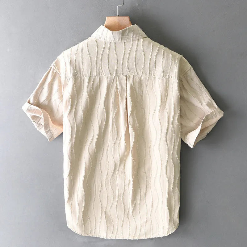 Men's apricot pure cotton loose fit casual short sleeve shirt on a hanger