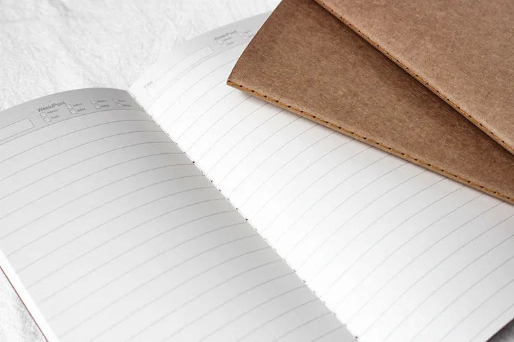 Cowhide diary refill insert showing dot grid and ruled pages with 11x21cm dimensions