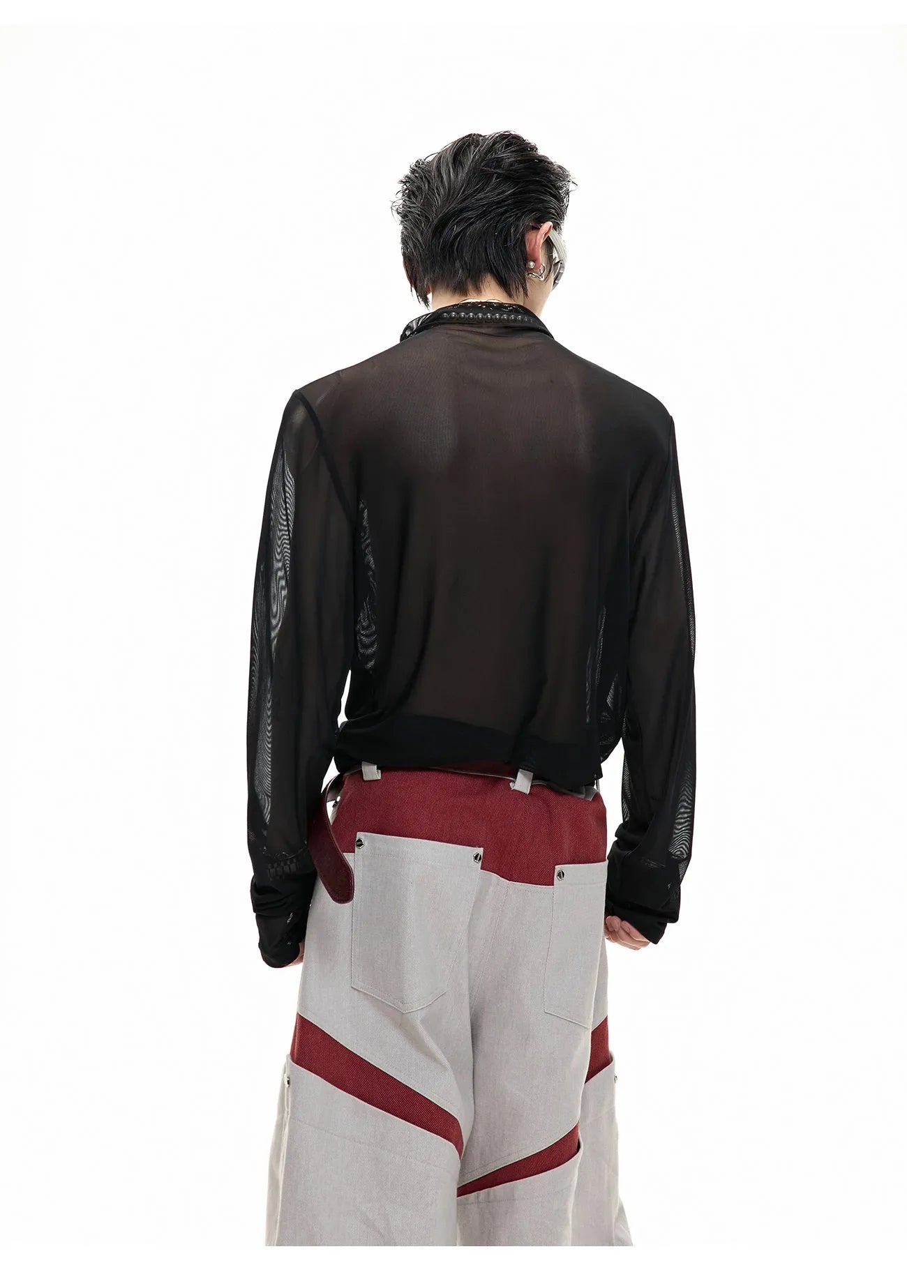 Black slim long sleeve mesh bottoming shirt on a hanger showing its fit and fabric texture.