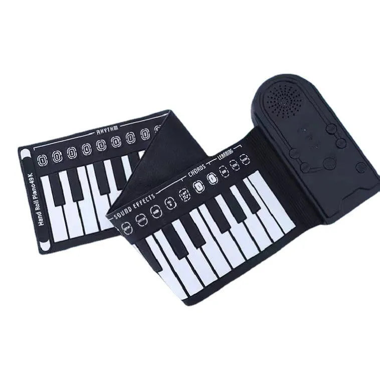 Pearl white portable electronic keyboard with rolled-out silicone keys and compact ABS plastic control panel.