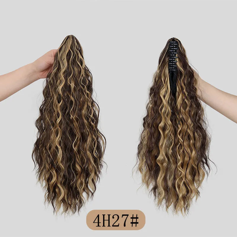 Synthetic corn curler wig with a textured water ripple grip ponytail, shown in a shade from the available colour range.
