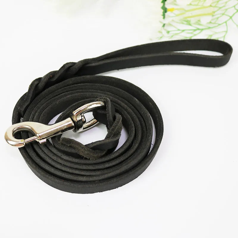 Light brown cowhide dog walking rope with leather hand loop, shown at full length.