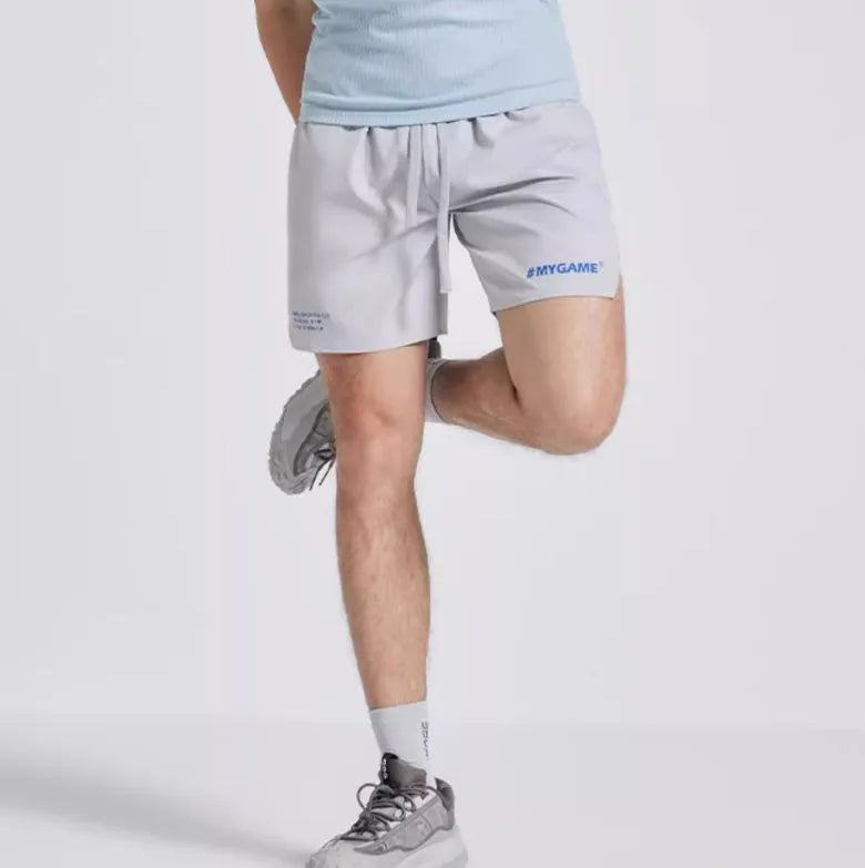 Men's training shorts in a polyester and spandex blend, shown in a colour option from the Midnight Blue, Black, Grey, White range.