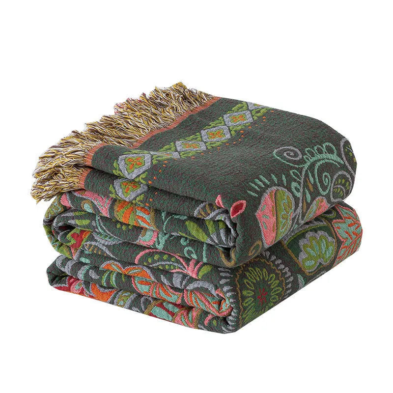 Cotton gauze towel blanket with tassel edging in neoclassical floral pattern, available in 150x200cm and 200x230cm.