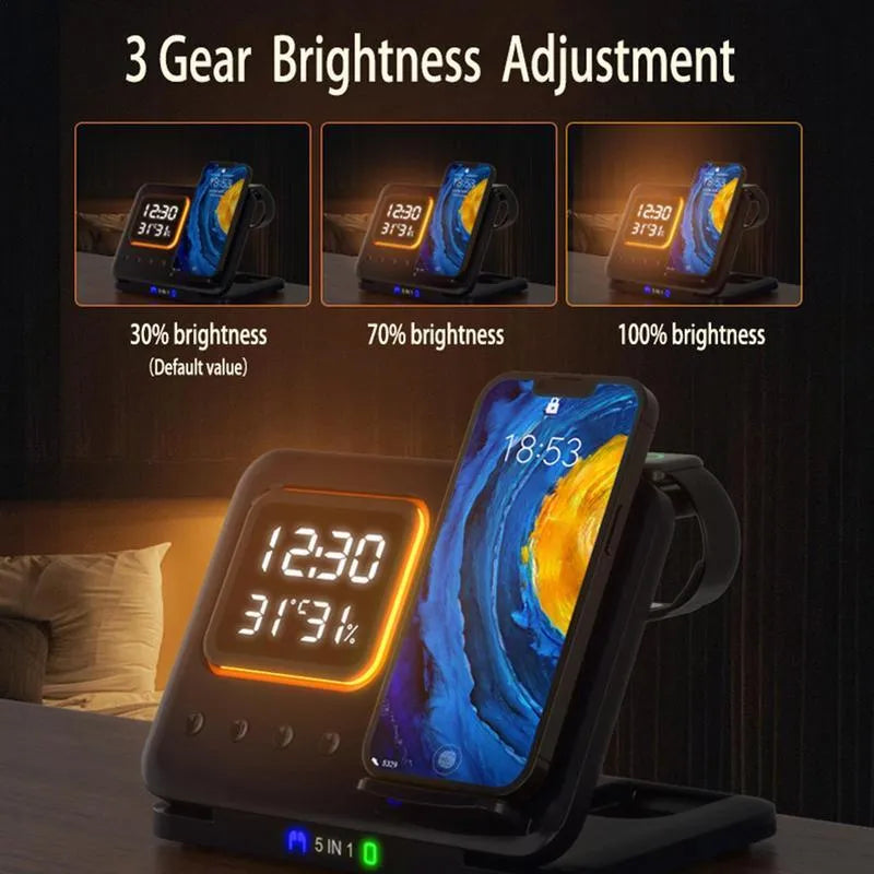 Black 5-in-1 wireless charging station displaying time and temperature, charging a phone and a smartwatch.