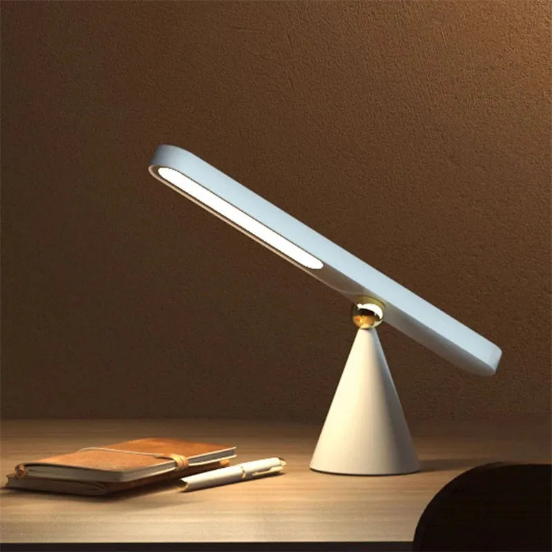 Geometric white desk lamp with magnetic base and touch controls for reading and ambient lighting