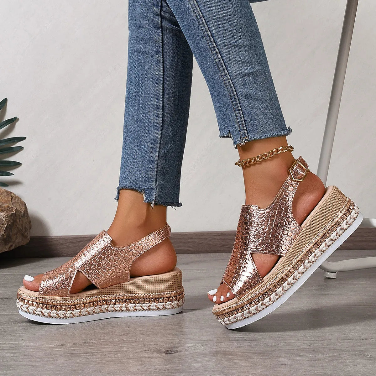 Gold women's Roman shoes with round toe, hollow-out design, and adjustable ankle buckle