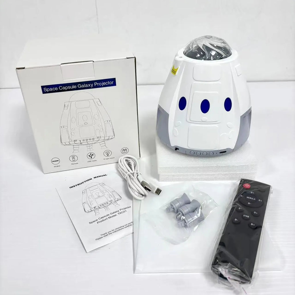 Space capsule shaped USB projection lamp showing galaxy light effect on a wall