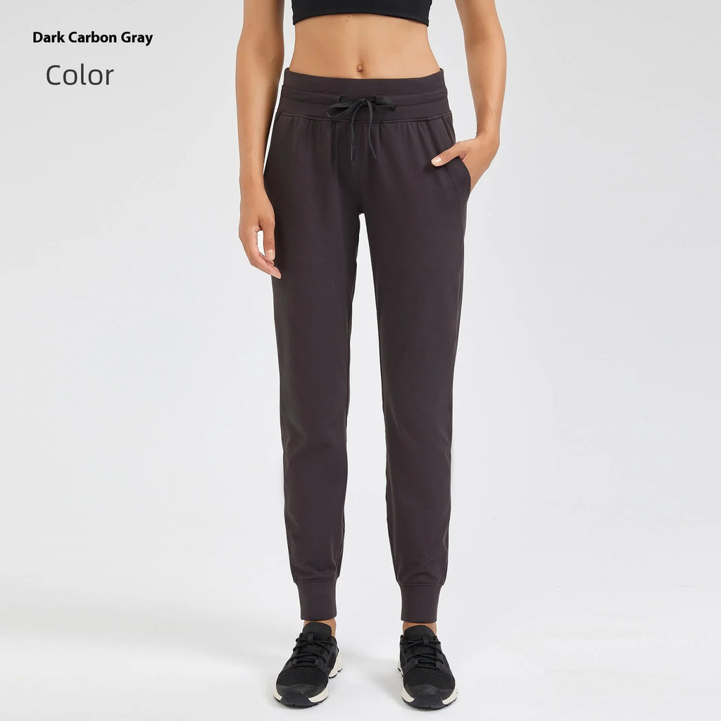 Women's high waist yoga pants with a drawstring waistband in distilled coffee colour.