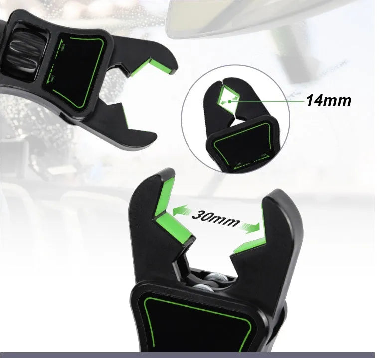 Black and green car mobile phone holder mounted on a rear-view mirror bracket.