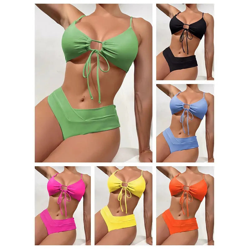 Women's pure colour tied bow split swimsuit bikini on a hanger, showing brief cut.