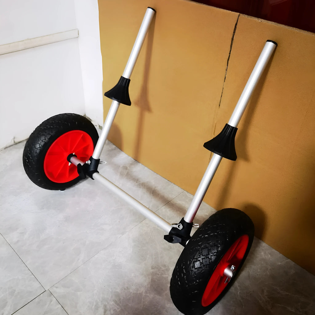 Foldable aluminium kayak cart with wide rubber tyres and a platform, shown folded and assembled.