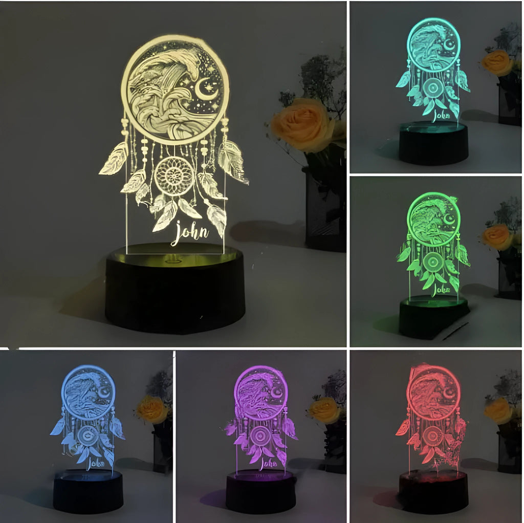 Modern acrylic dream catcher night light with remote control on a table.