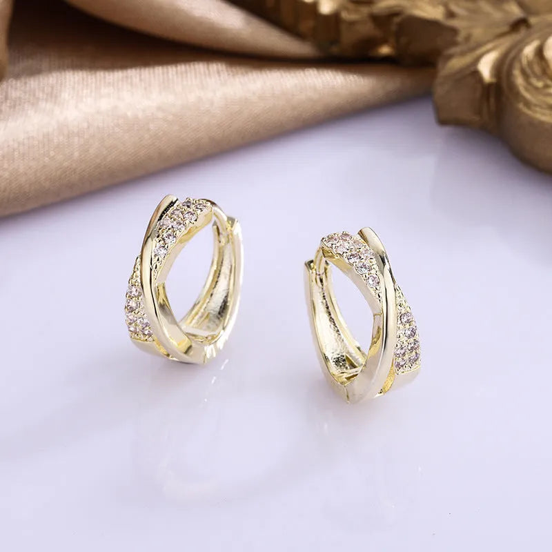 Geometric earrings with zircon embellishments in 14K yellow gold plating on copper