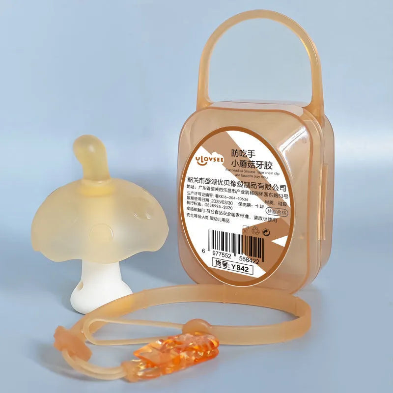 Small pink and translucent nano mushroom-shaped silicone chew toys with transparent storage boxes and chains.