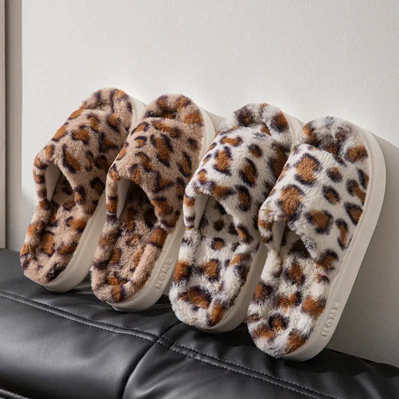 Women's leopard print slippers with suede upper, hollow-out design, and EVA sole