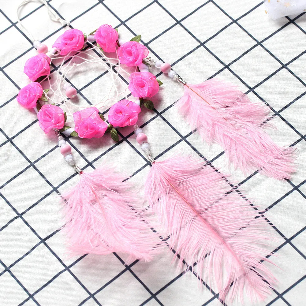 Pink dreamcatcher wind chime wall decoration with ostrich feathers, 10cm diameter