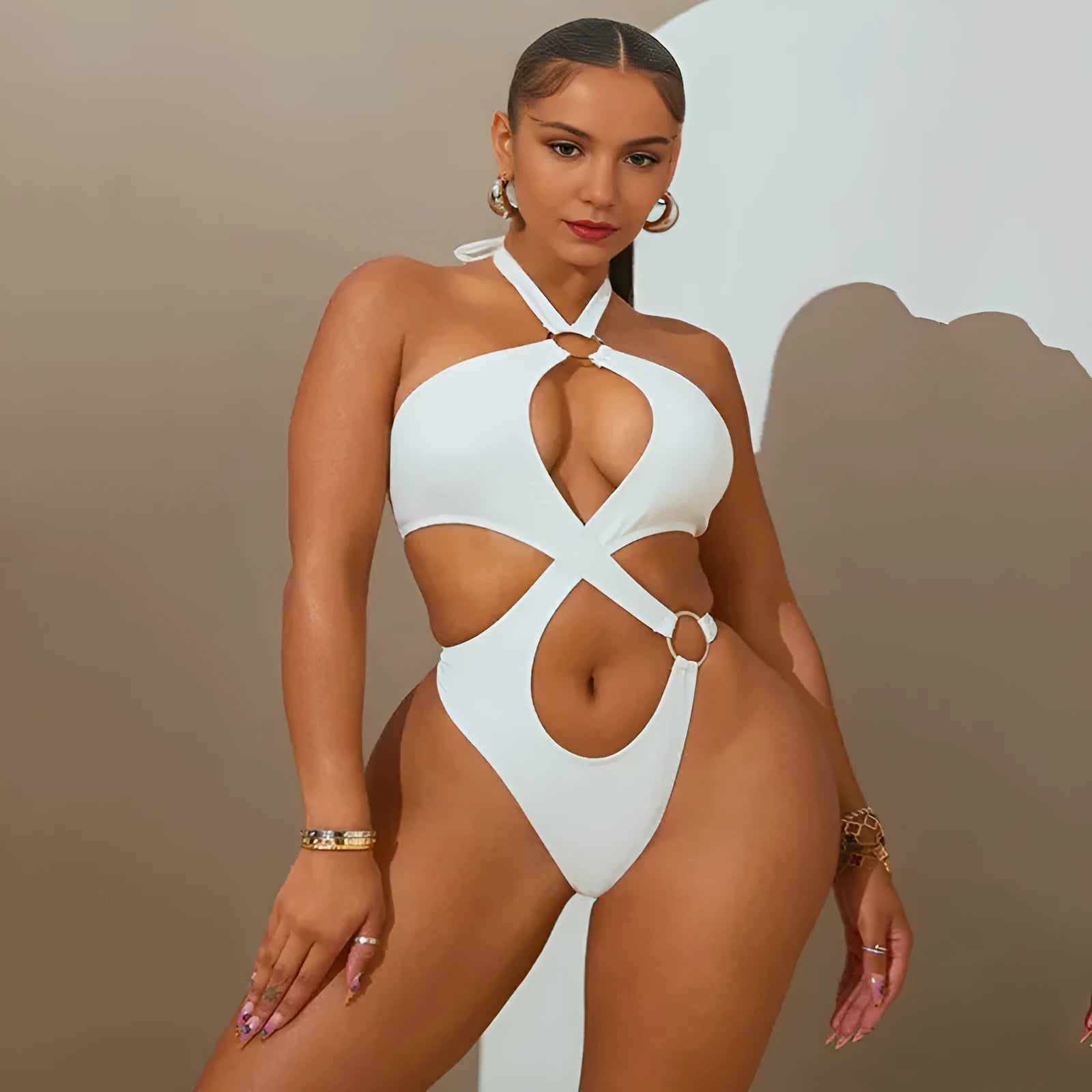 Women's sleeveless jumpsuit with back lace-up detail and shorts length in black, blue or white colour options