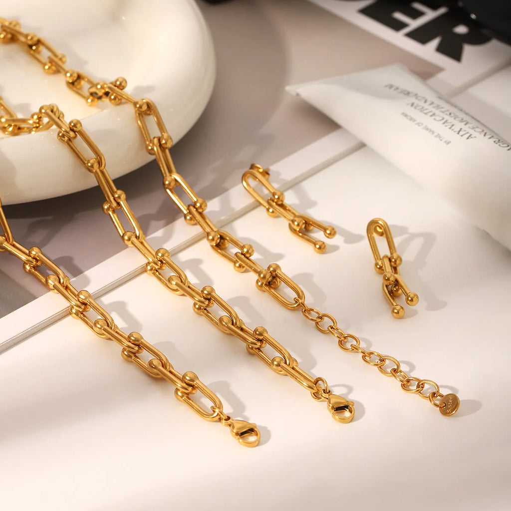 Stainless steel horseshoe necklace, bracelet and earrings set with titanium steel pendant and vacuum electroplating finish