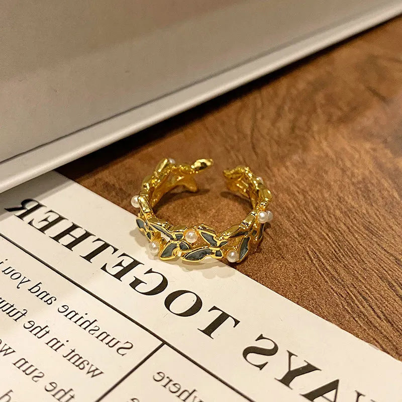 Copper women's ring with Chinese butterfly design and oil-drip finish in simple jewellery style
