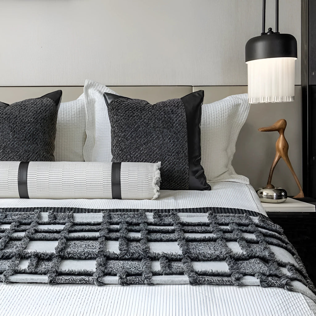 Grey and white plaid bed runner and nap blanket set with a pillow on a 1.8m bed, demonstrating universal fit.