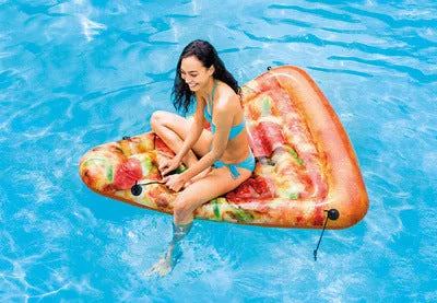 Large green and red pizza themed inflatable surfboard float on water