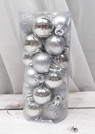 Assortment of 3cm diameter shiny matte plastic Christmas baubles in gold, red, silver, blue, and pink colours.