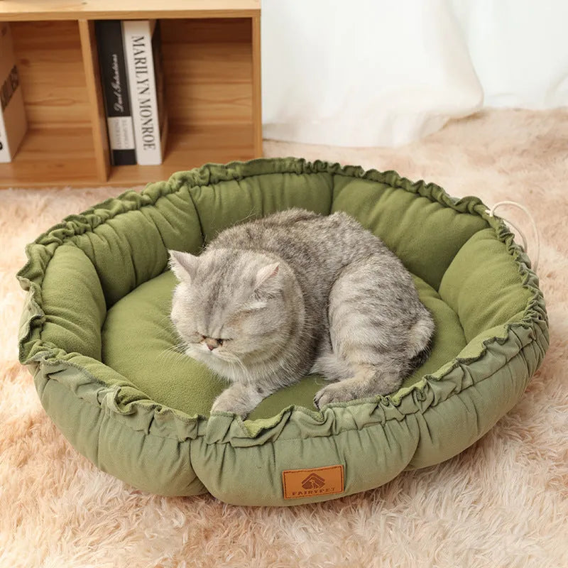 Grey reversible cat bed showing both donut and open nest configurations