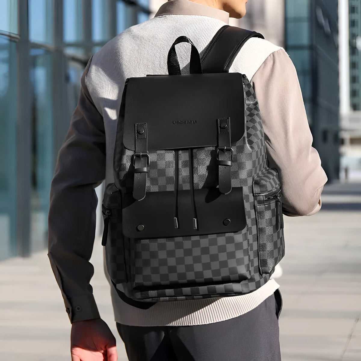 Men's plaid backpack in black round plaid with PU outer, polyester lining and curved shoulder strap
