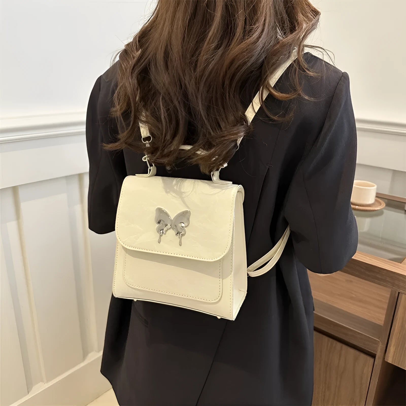 Women's preppy style PU synthetic leather backpack with bow detailing in six colour options