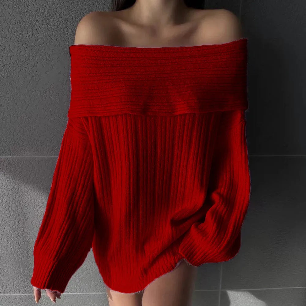 Women's loose long sleeve acrylic pullover sweater in white, shown laid flat.