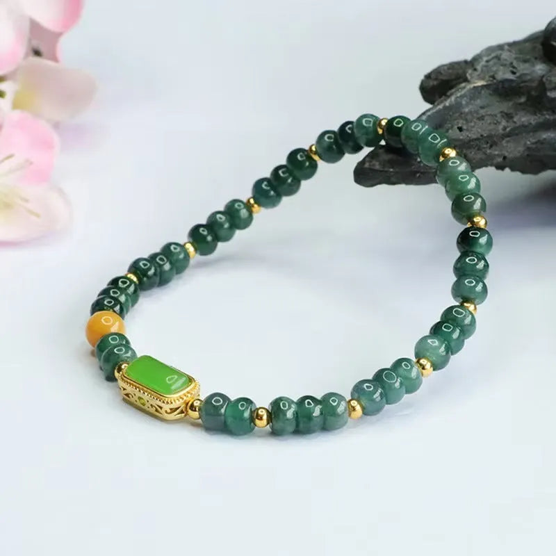 Blue natural stone bracelet with abacus beads in geometry shapes including round, oval and ring elements