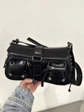 Black PU messenger bag with adjustable crossbody strap showing internal zipper change compartment