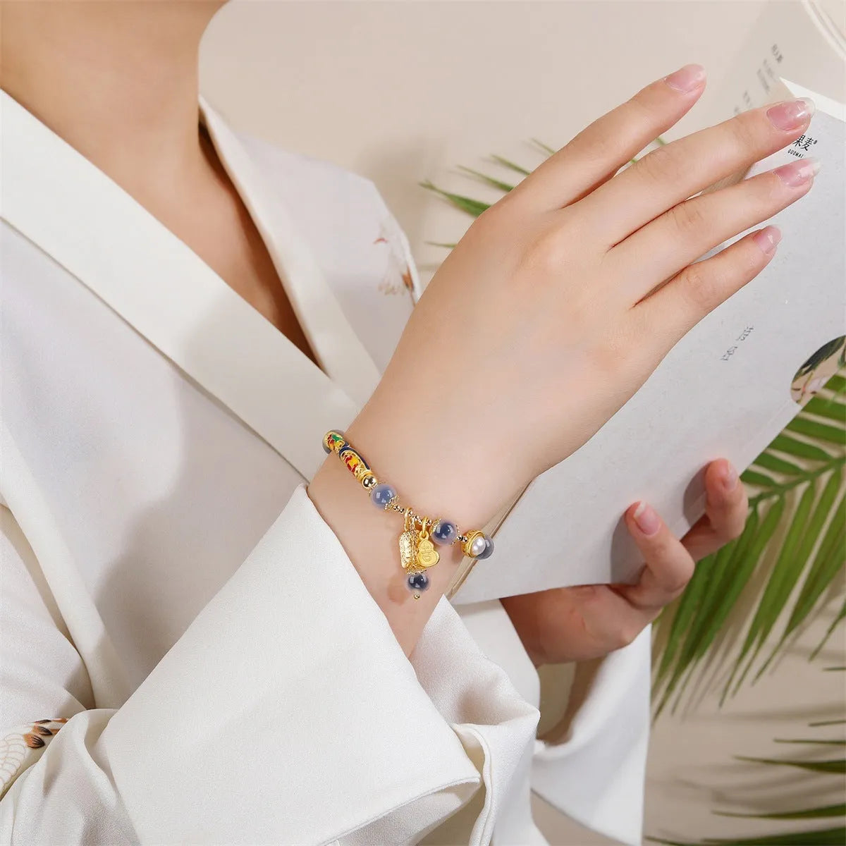 Sugar heart agate bracelet with retro minority design on woman's wrist showing handmade craftsmanship