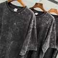 Men's black cotton short-sleeved casual top shown on a plain background