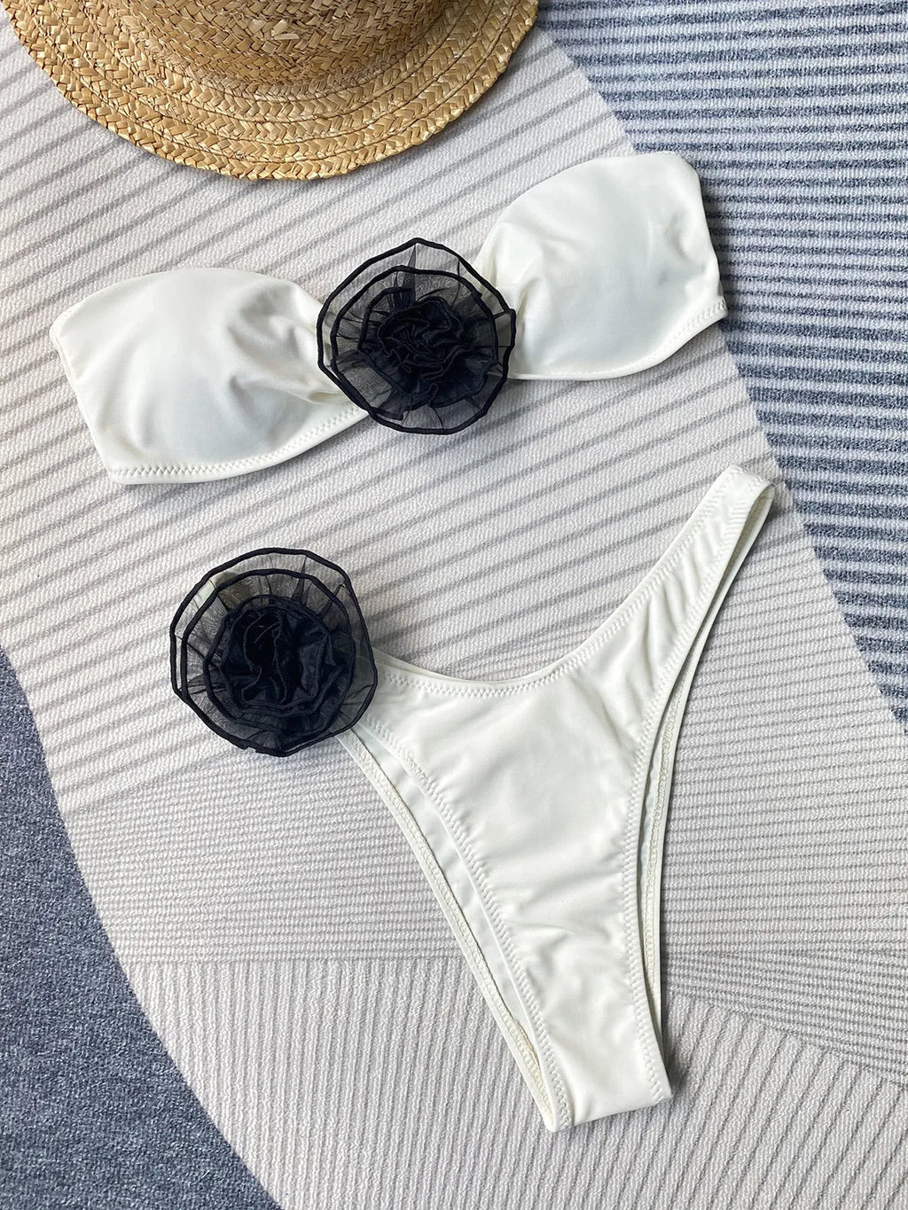 Black and white striped bikini swimsuit with a cross-border tube top, three-dimensional flower detail, and matching shorts.