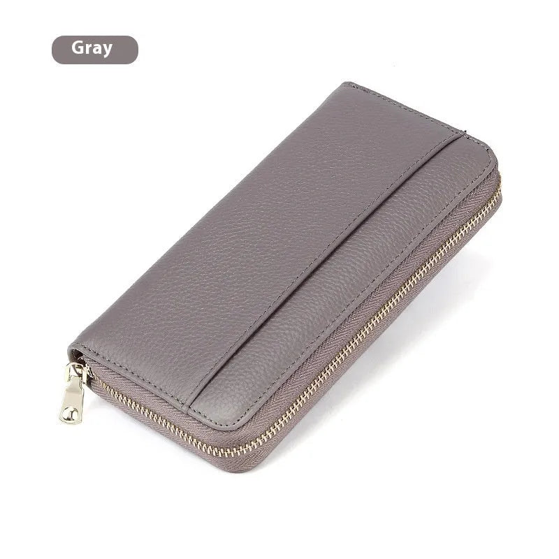 Women's long genuine leather wallet in a choice of six colours showing large capacity and anti-theft card slot.