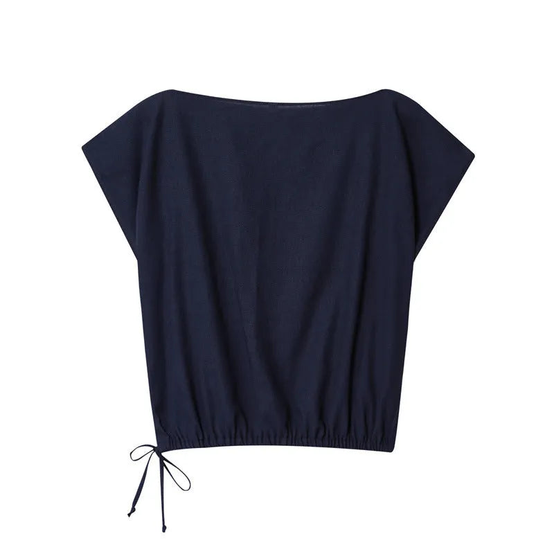 Women's high-neck blouse with flounced sleeves and matching wide-leg trousers in a formal suit set.