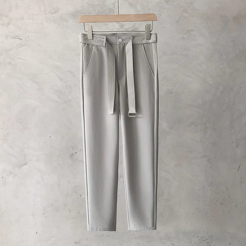 Boys slim straight wool trousers in tapered fit, shown in light grey colour.