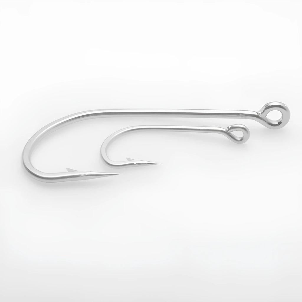 Assortment of stainless steel alloy fishhooks for sea fishing on a blue background.
