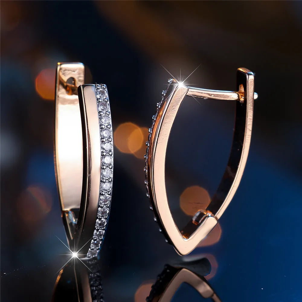 Women's V-shaped geometric ear clips in champagne gold white diamond finish